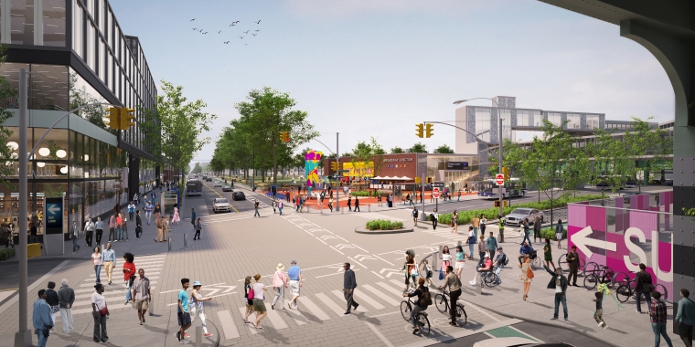 Rendering of Broadway Junction showing busy intersection with many pedestrians, cyclists, and cars. Trees line the streets, colorful public art and a playground are visible, and modern buildings surround the area under a partly cloudy sky.